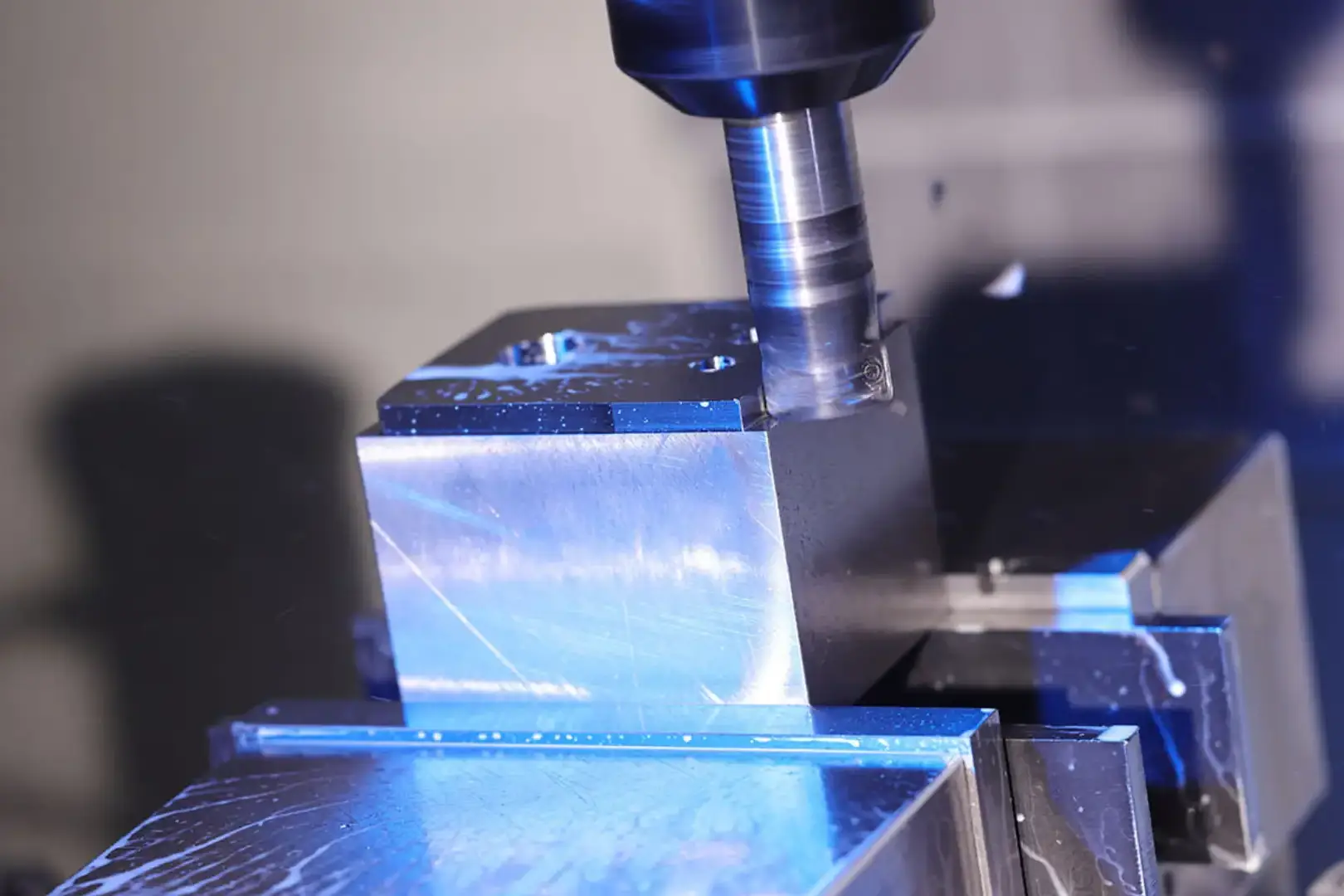 CNC milling metal block.