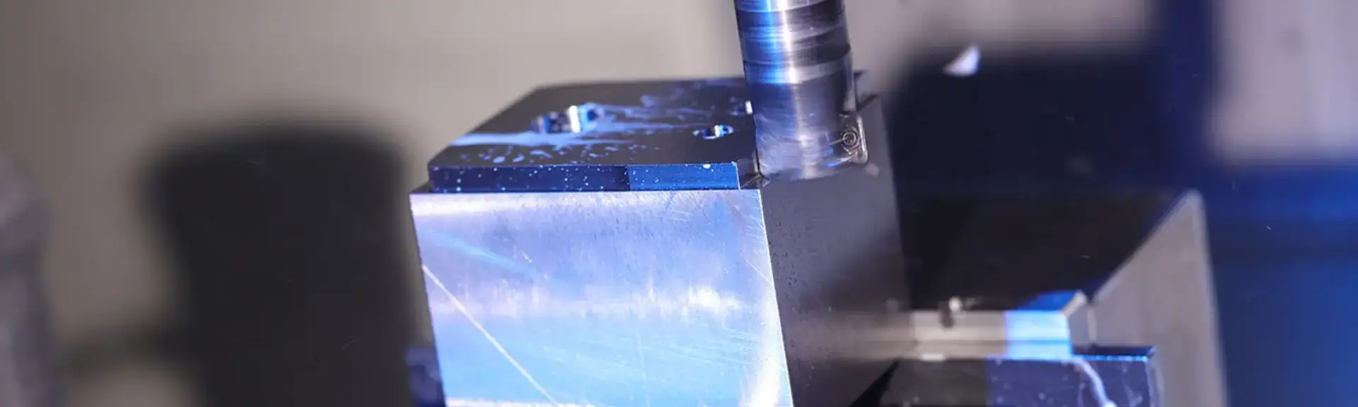 CNC milling metal block.