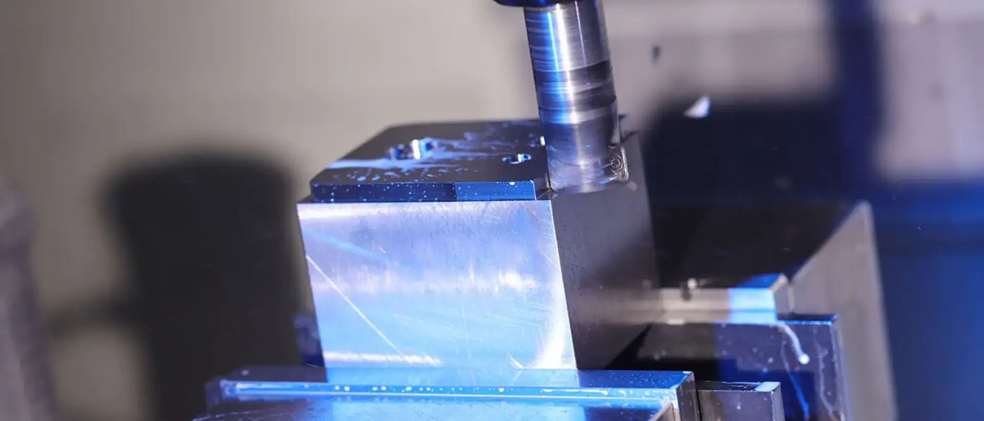 CNC milling metal block.