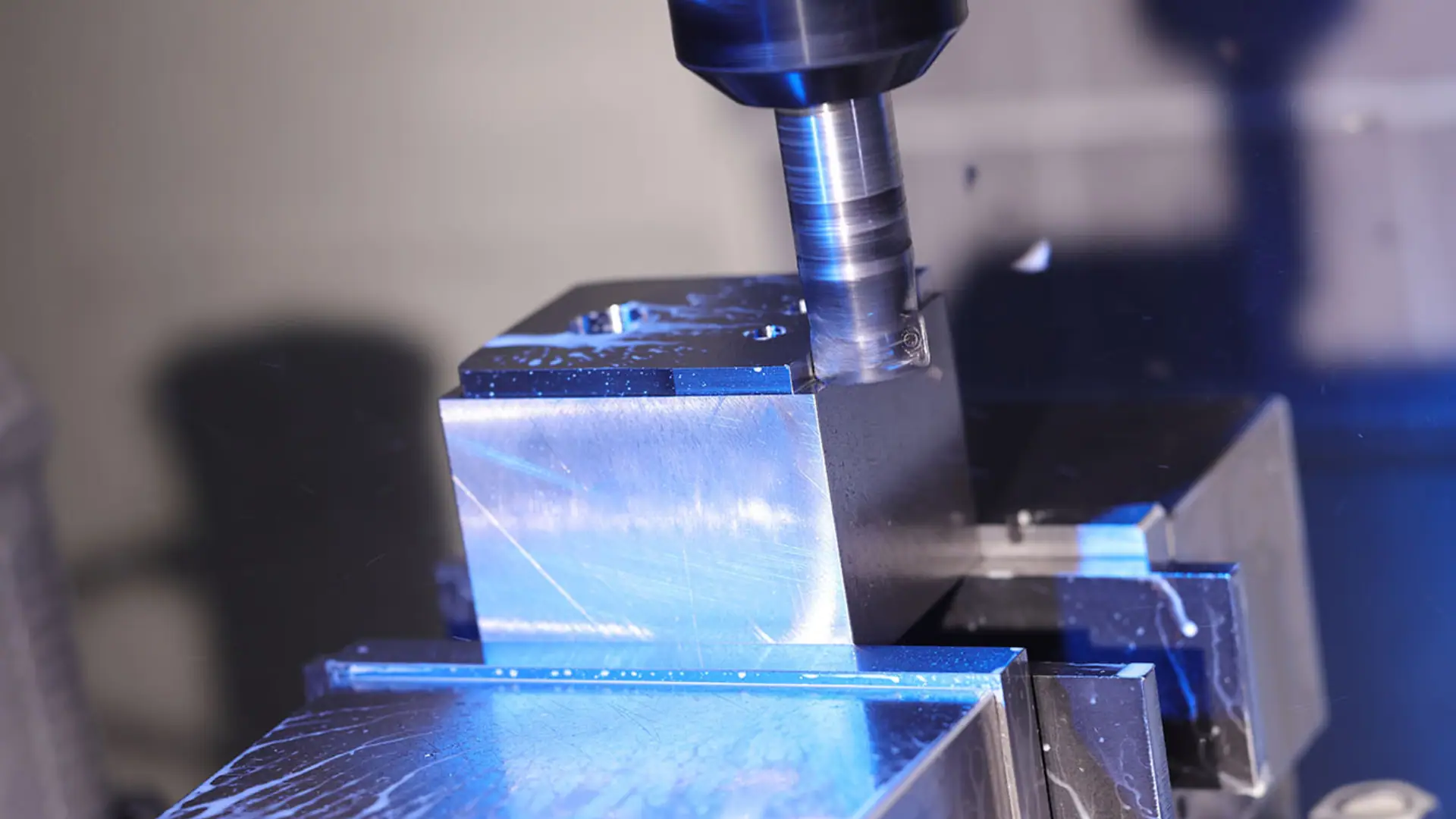 CNC milling metal block.