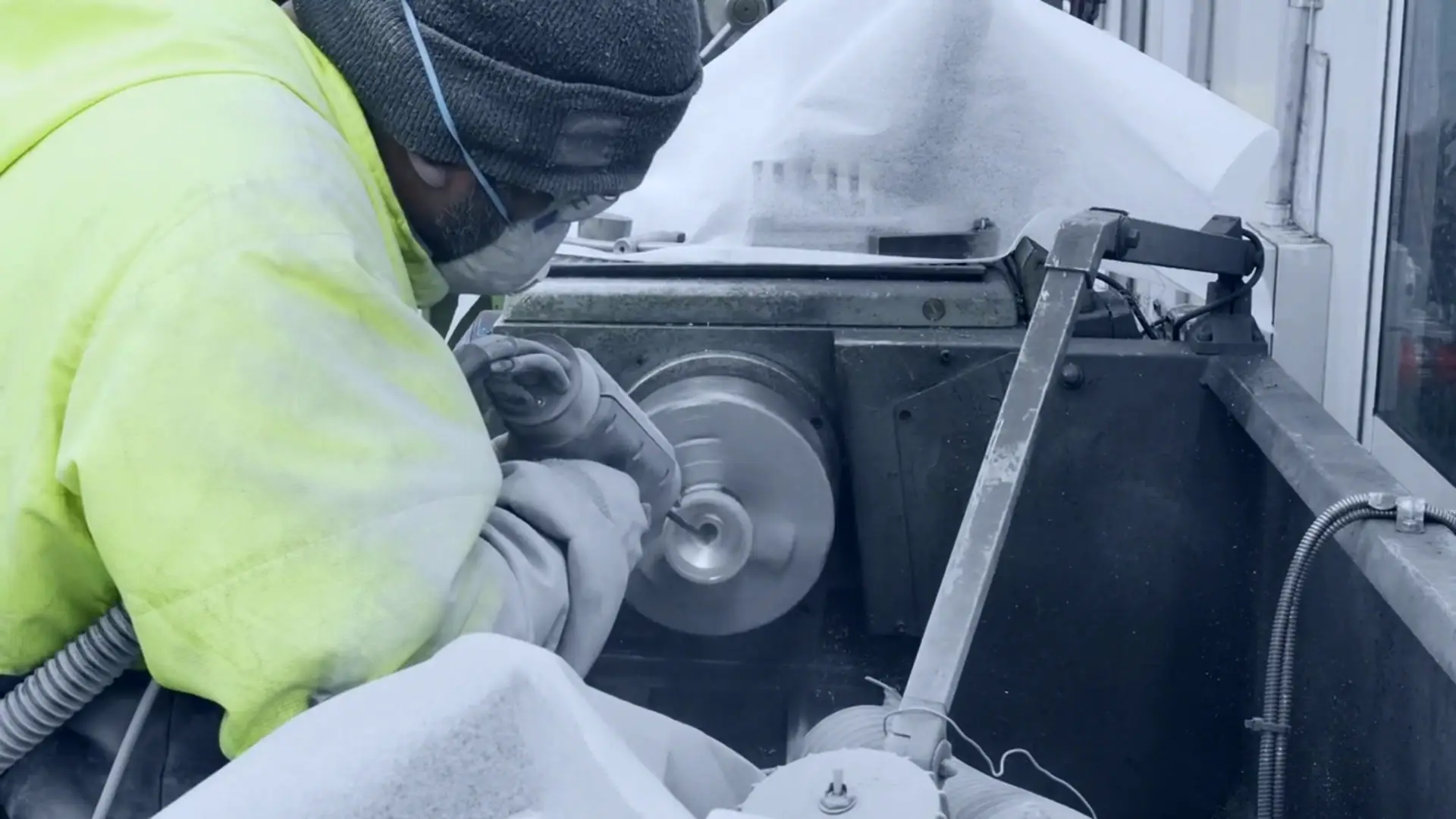 Cold spray being applied to lathe.