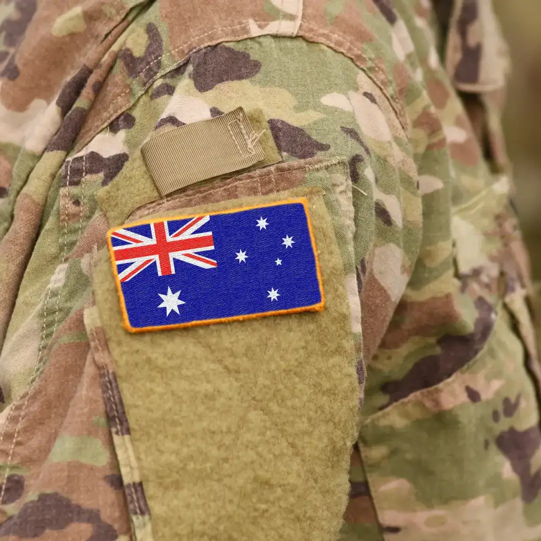 Australian Defence solider with Australian flag.